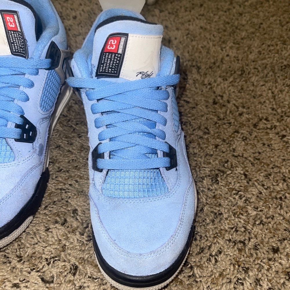Jordan retro 4 university blue kids 7 women’s 7.5-8